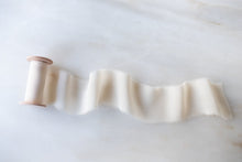 Load image into Gallery viewer, close up of a cream silk chiffon ribbon 