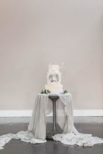 Load image into Gallery viewer,  An elegant grey silk chiffon table runner with modern white wedding cake
